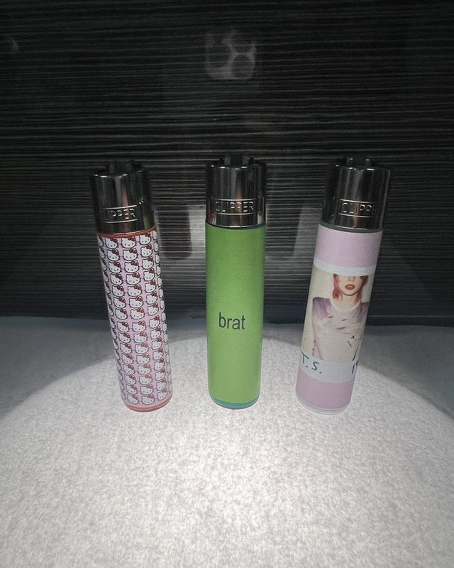 Three custom printed lighters side by side: a pattern, a colour block and a photo wrap